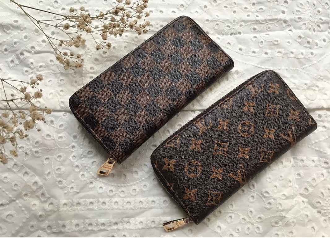 Louis Vuitton Leather Crafted Zipper Wallet