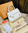 Louis Vuitton Cluny Handbag