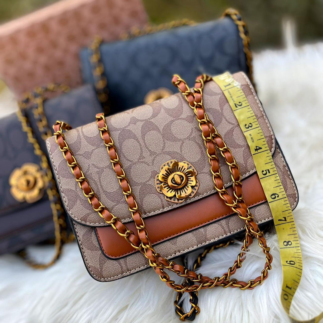 Coach Sleek Cross Body Bags