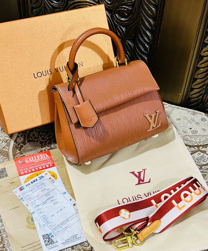 Louis Vuitton Cluny Handbag