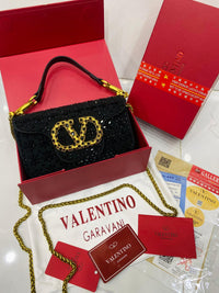 V Top Handle Clutch Bag