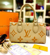 LV On the Go Medium Statement Bag