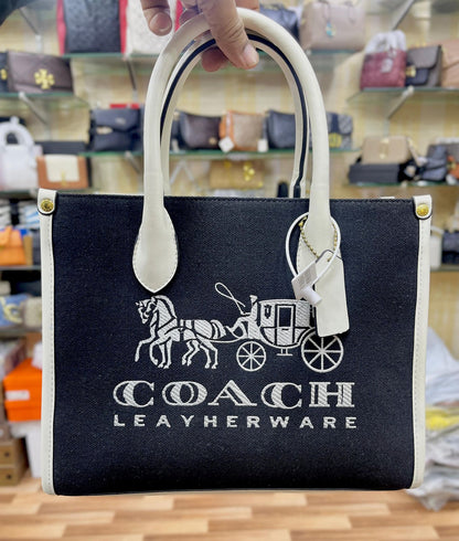 Canvas Coach Vike Cross Body Bags