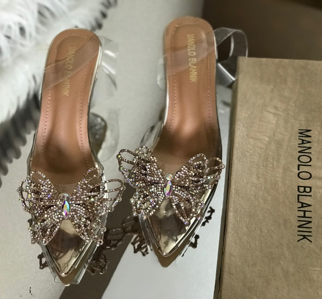 Manolo Strikes Heels