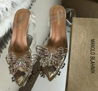 Manolo Strikes Heels